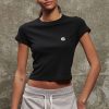 HEXCLAD_lifestyle_10.jpg Classic Logo Badge Women-s Cropped Tee — M