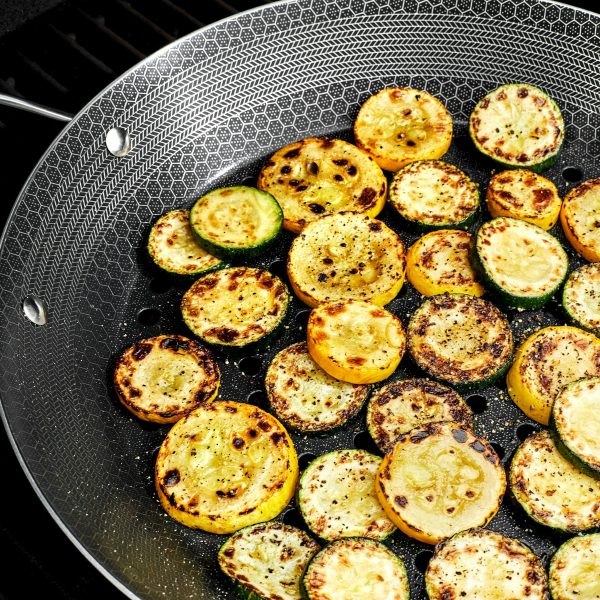HexClad_HybridBBQGrillPan_CWBQ12-C_WarmGrilledZucchiniFeta_BasilSalad_041924_KF_01.jpg HexClad BBQ Grill Pan + Meat Cleaver Bundle