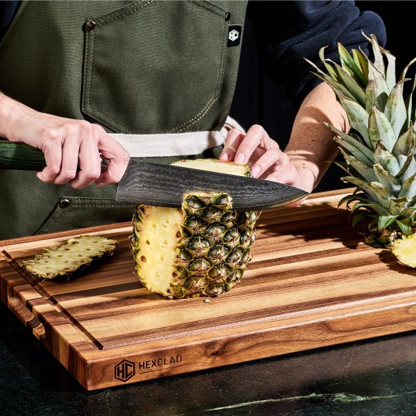 HexClad_LargeWalnutBoardV2_KWWB24-V2_ChefsKnife_CTCK08_Pineapple_012325_KF_01.jpg Walnut Cutting Board. Large