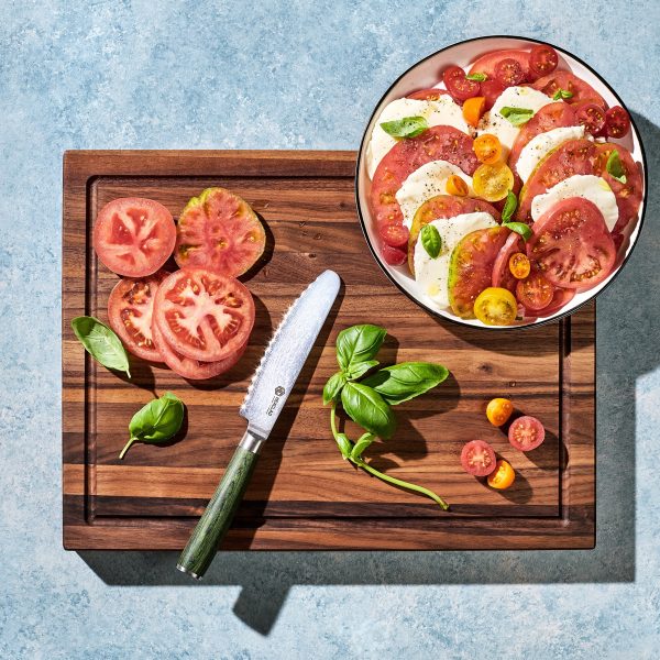 HexClad_MediumWalnutBoardV2_KWWB20-V2_5_BreadKnife_CTBK05-GPW_Caprese_012325_KF_02.jpg Walnut Cutting Board. Medium